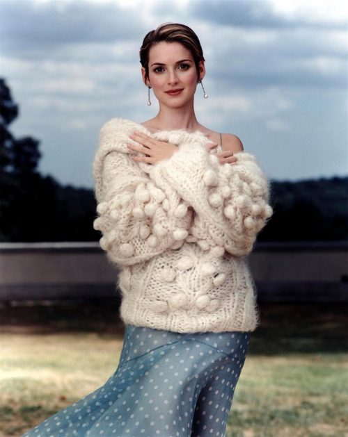 Woman in knitted white sweater