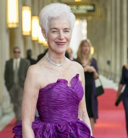 Liz Stiffel Wearing A Purple Dress